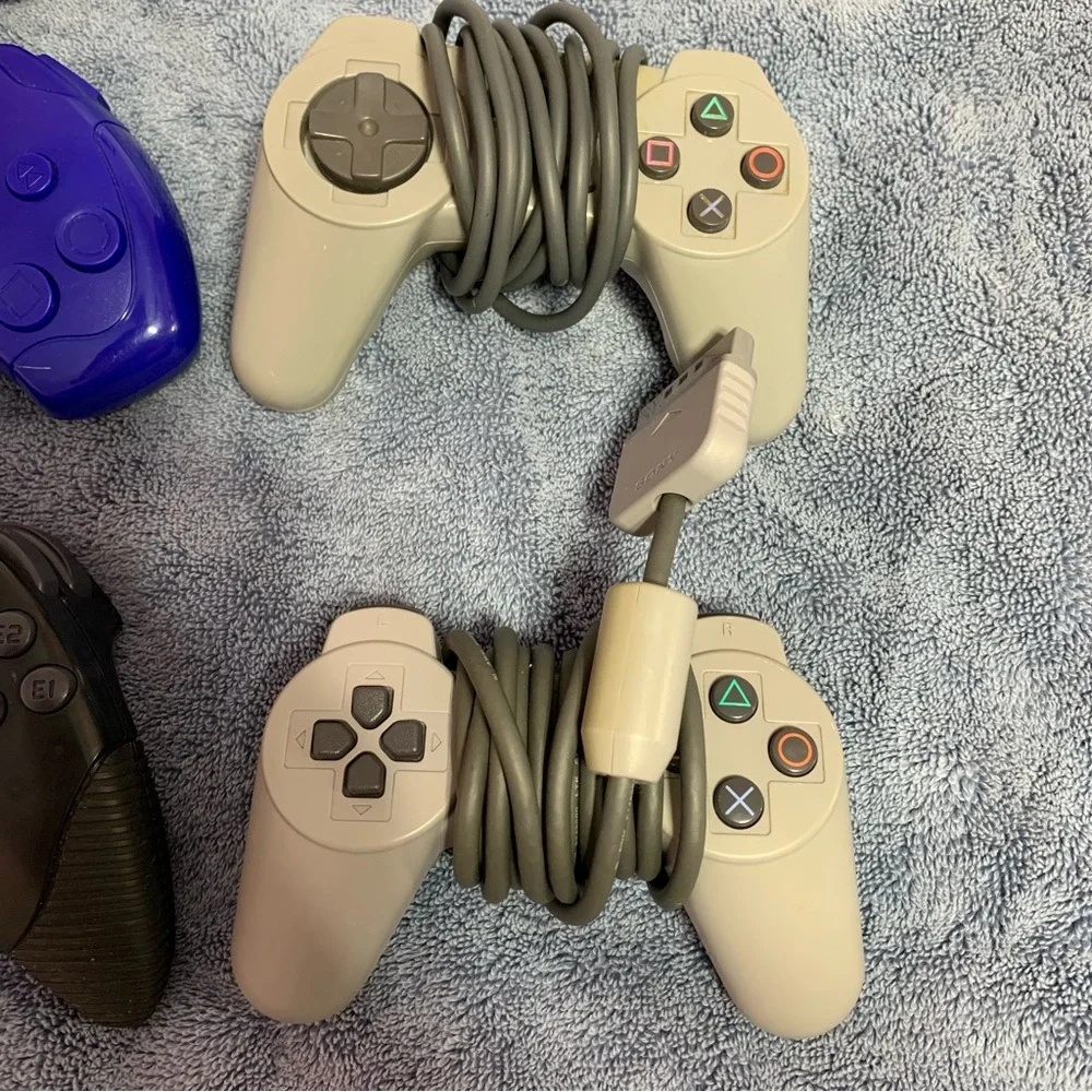 Vintage Sony PlayStation controllers remote control
